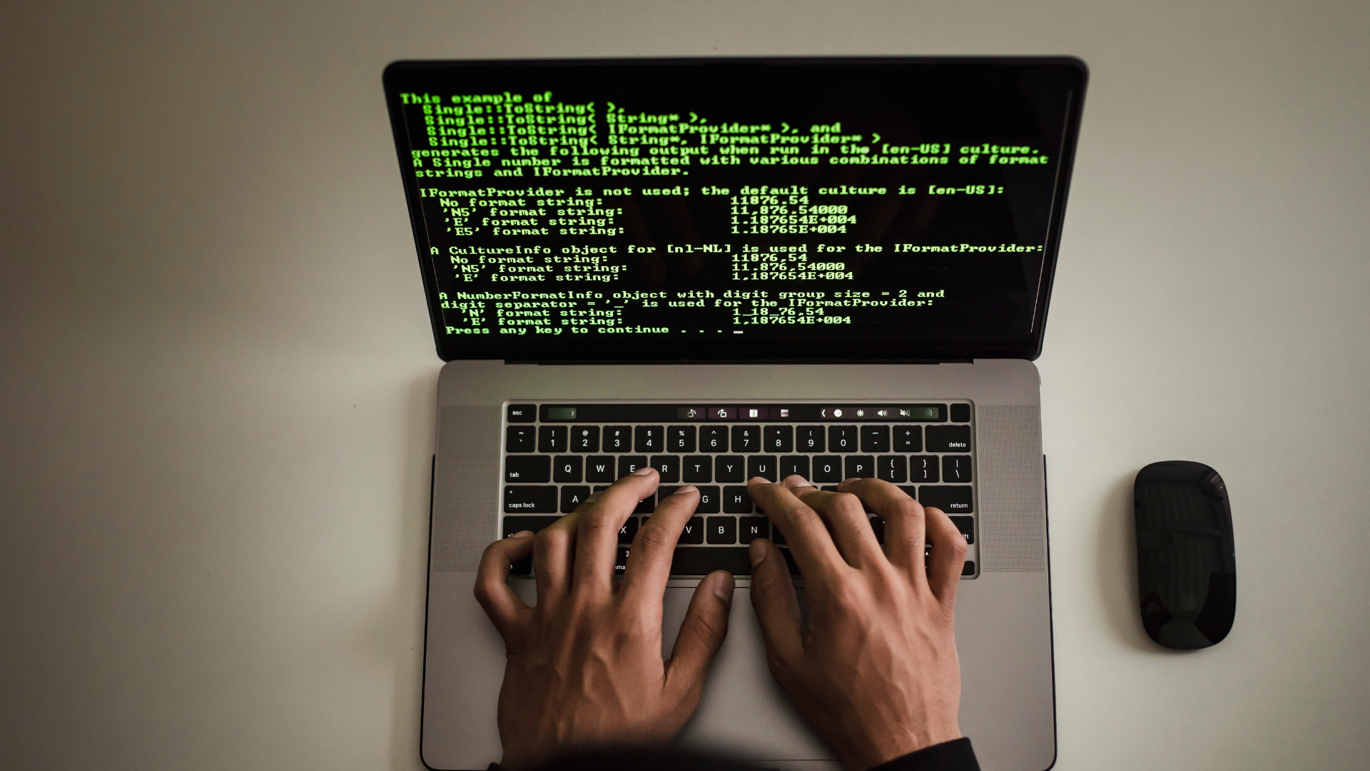 An image of a person on a laptop conducting some cyber security