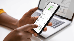 An image of someone making payments in installments for her small business.