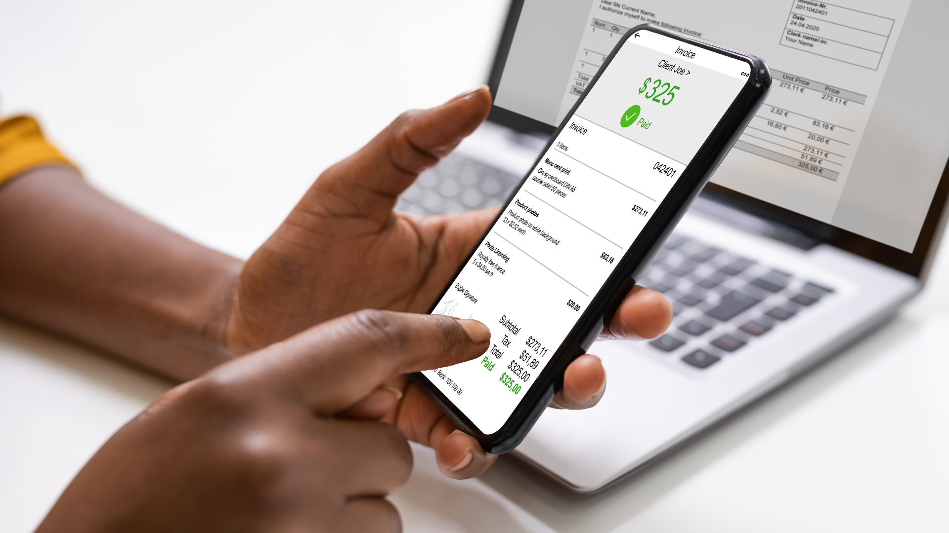 An image of someone making payments in installments for her small business.