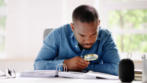 An image of a small business owner in Etobicoke reviewing his expenses to optimize his tax refunds