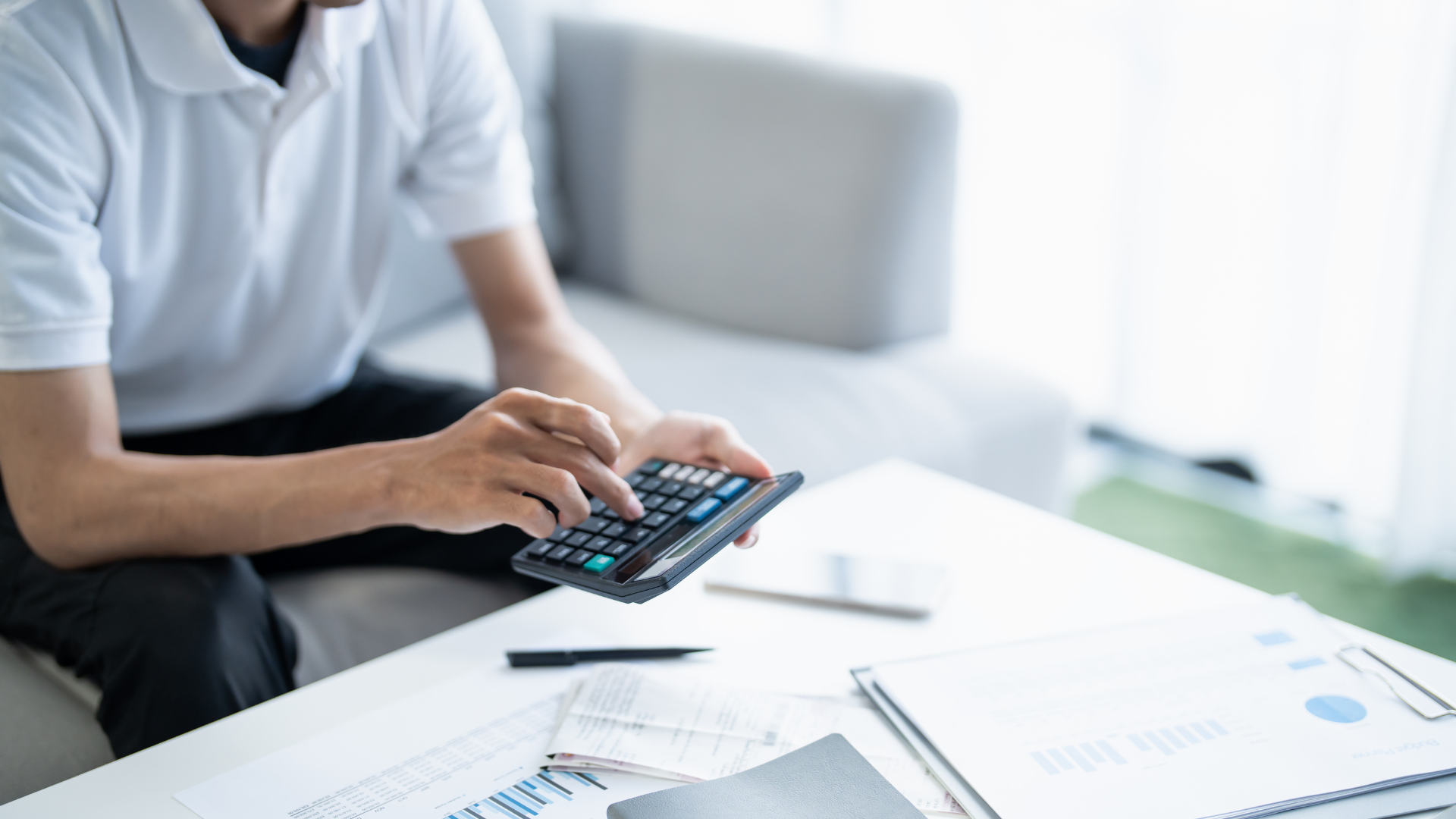 An image of a small business owner in Etobicoke who is reviewing his Input Tax Credits