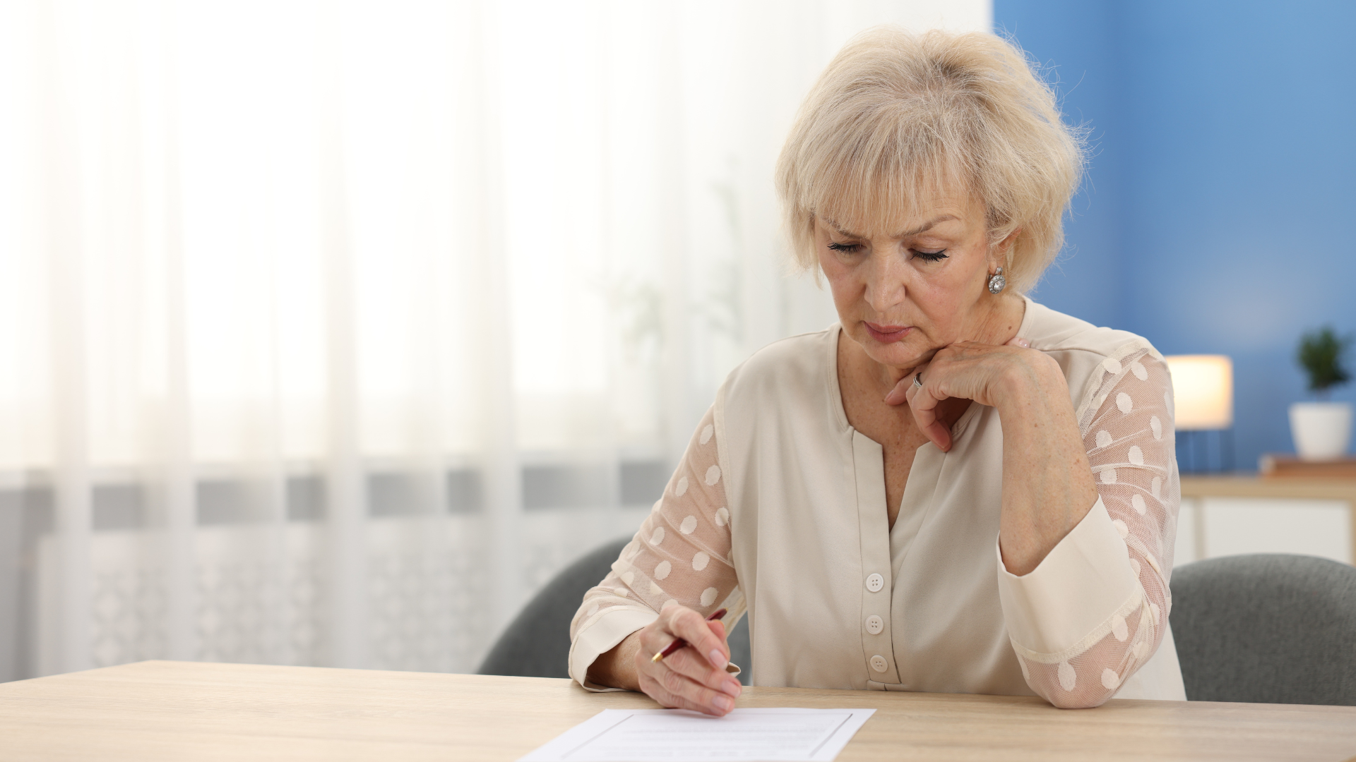 An image of an elderly lady who is thinking about strategies to protect her estate from Probate